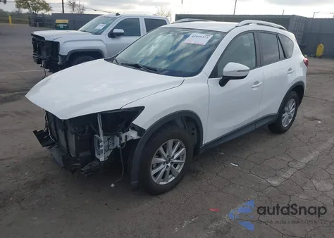 2015 Mazda Cx-5 Touring z USA, uszkodzony, nr VIN JM3KE2CY5F0553864